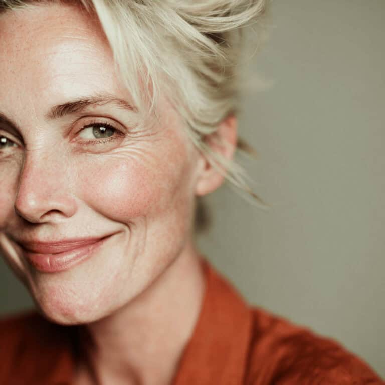 Vibrant woman experiencing renewed energy and vitality from anti-aging treatment